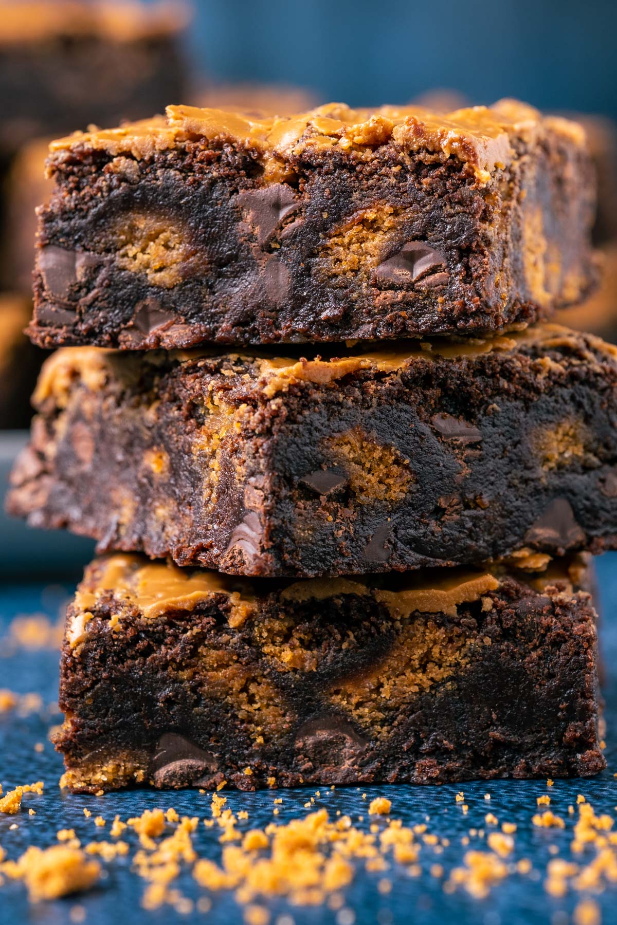 Stack of three biscoff brownies.