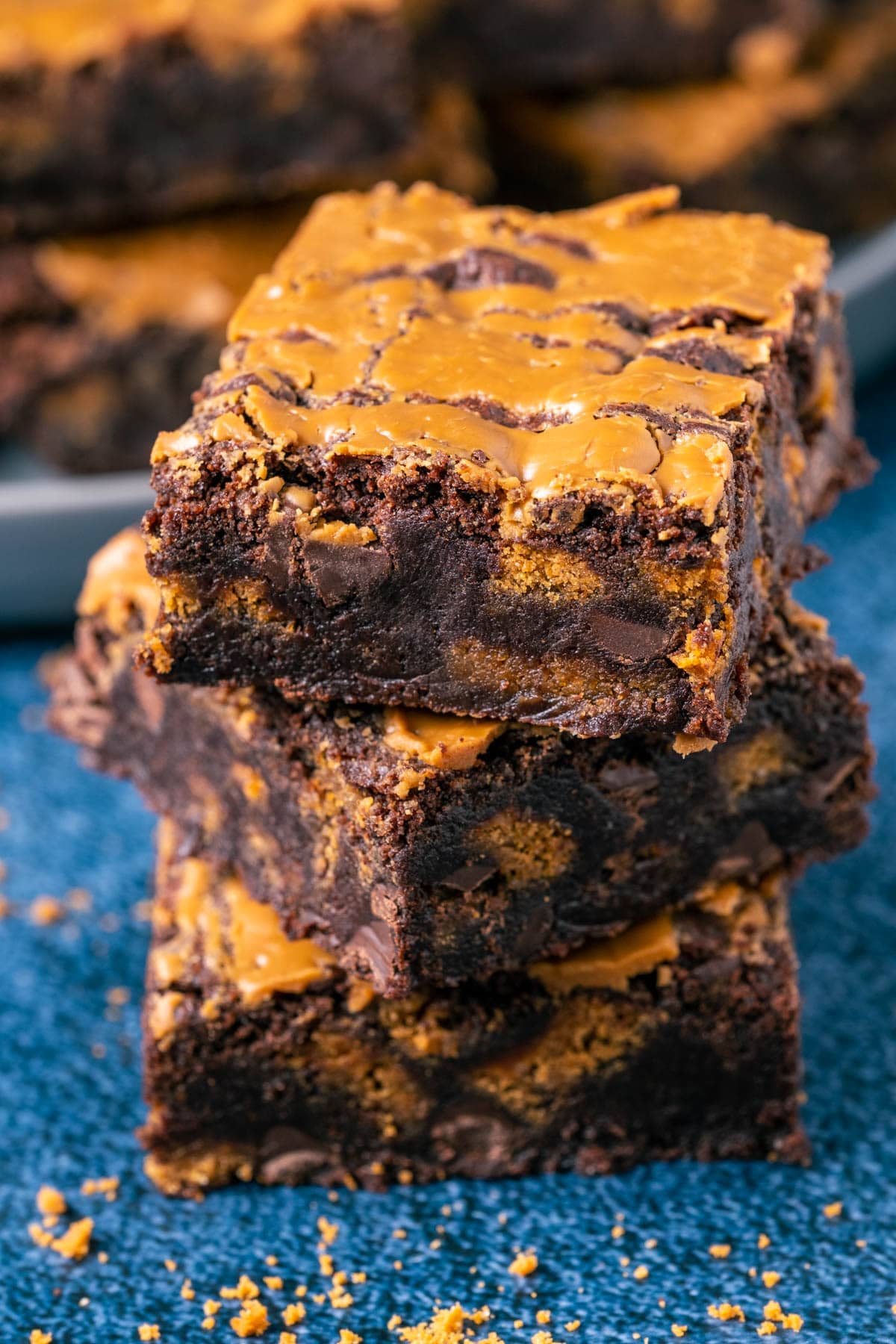 Stack of three biscoff brownies.