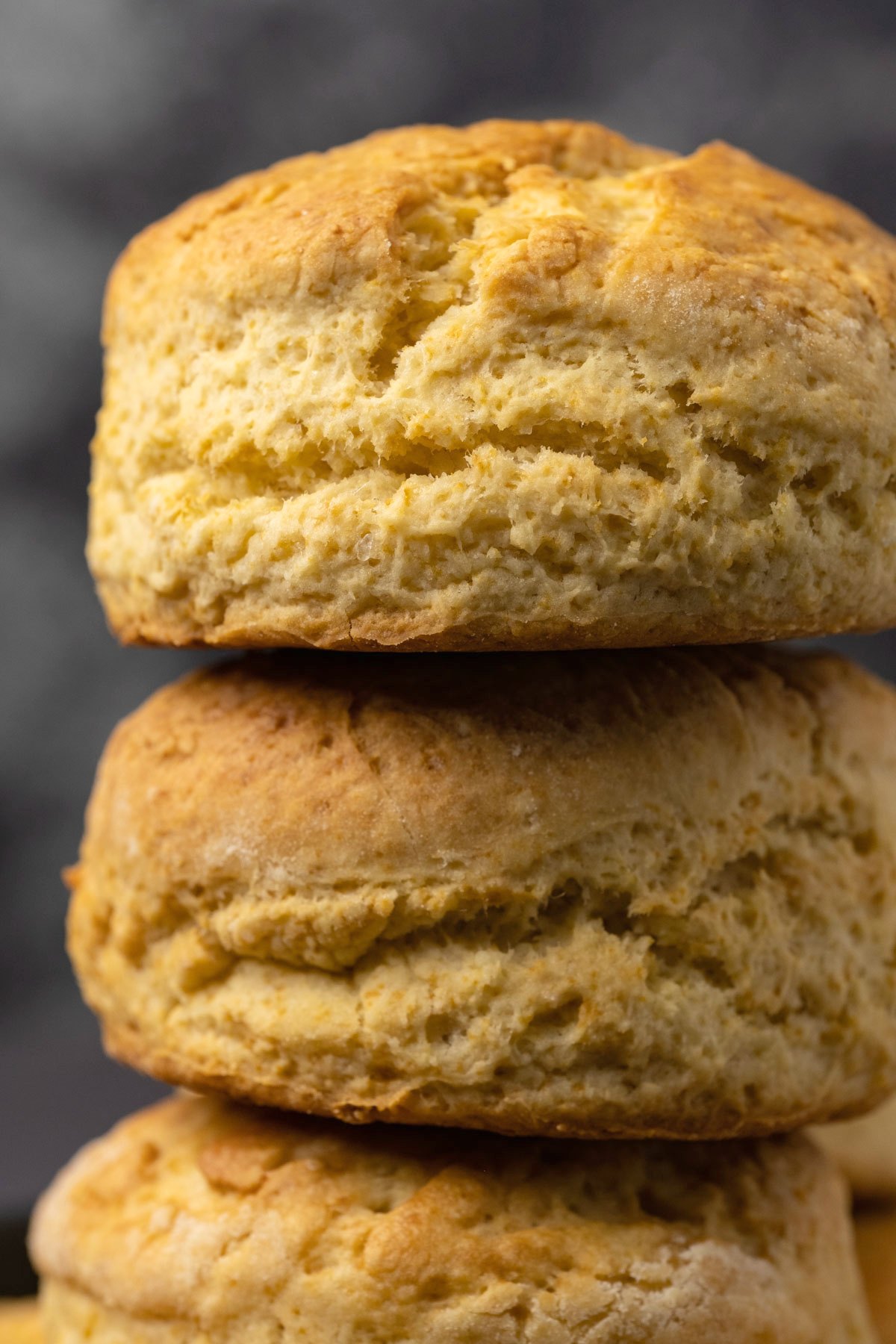 Vegan biscuits stacked up on top of each other. 