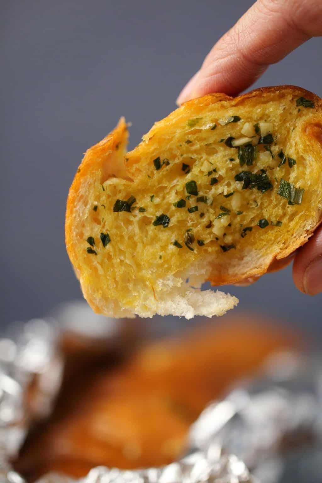 A slice of vegan garlic bread. 