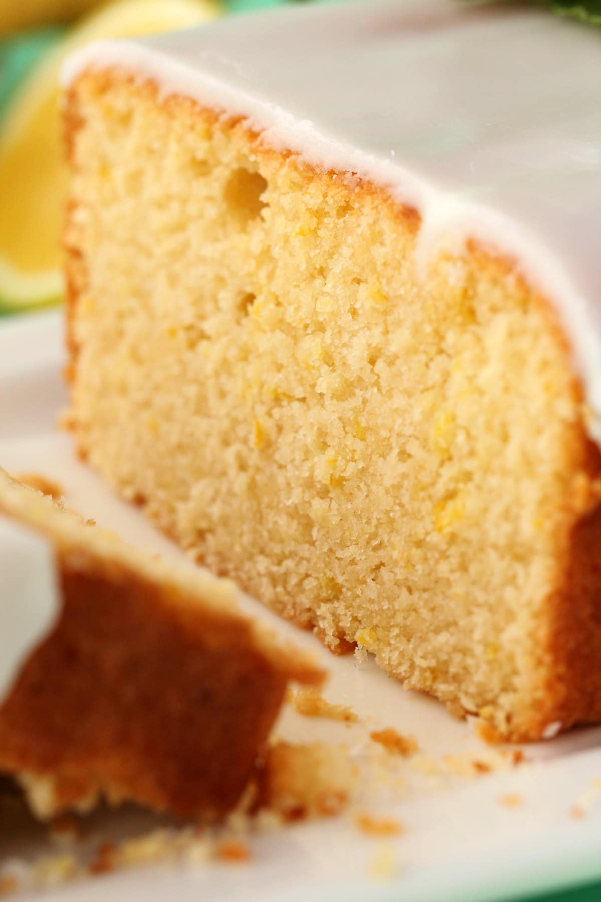 Sliced pound cake on a white plate. 