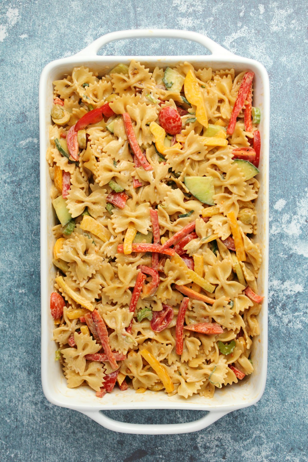 Vegan pasta salad in a white dish. 