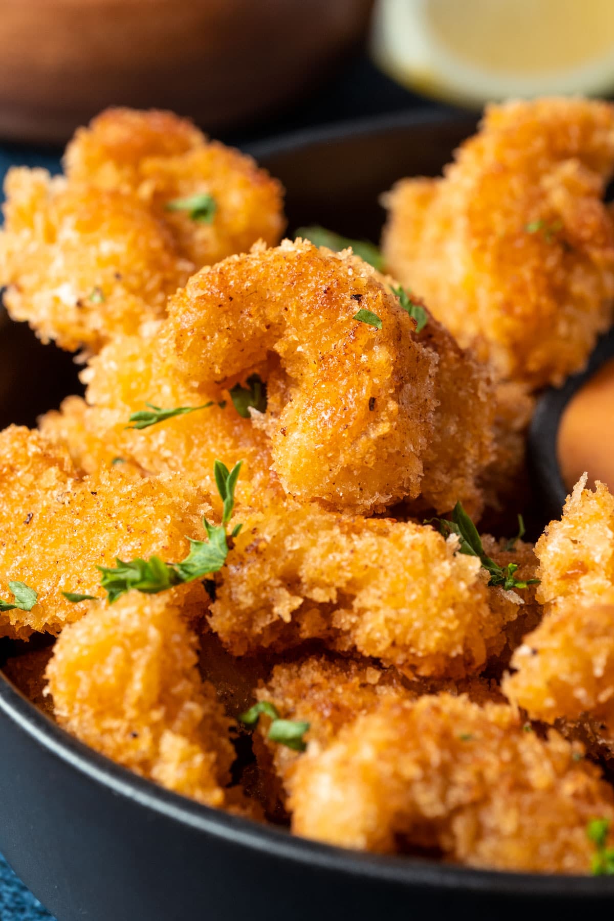 Vegan shrimp stacked up on a plate.