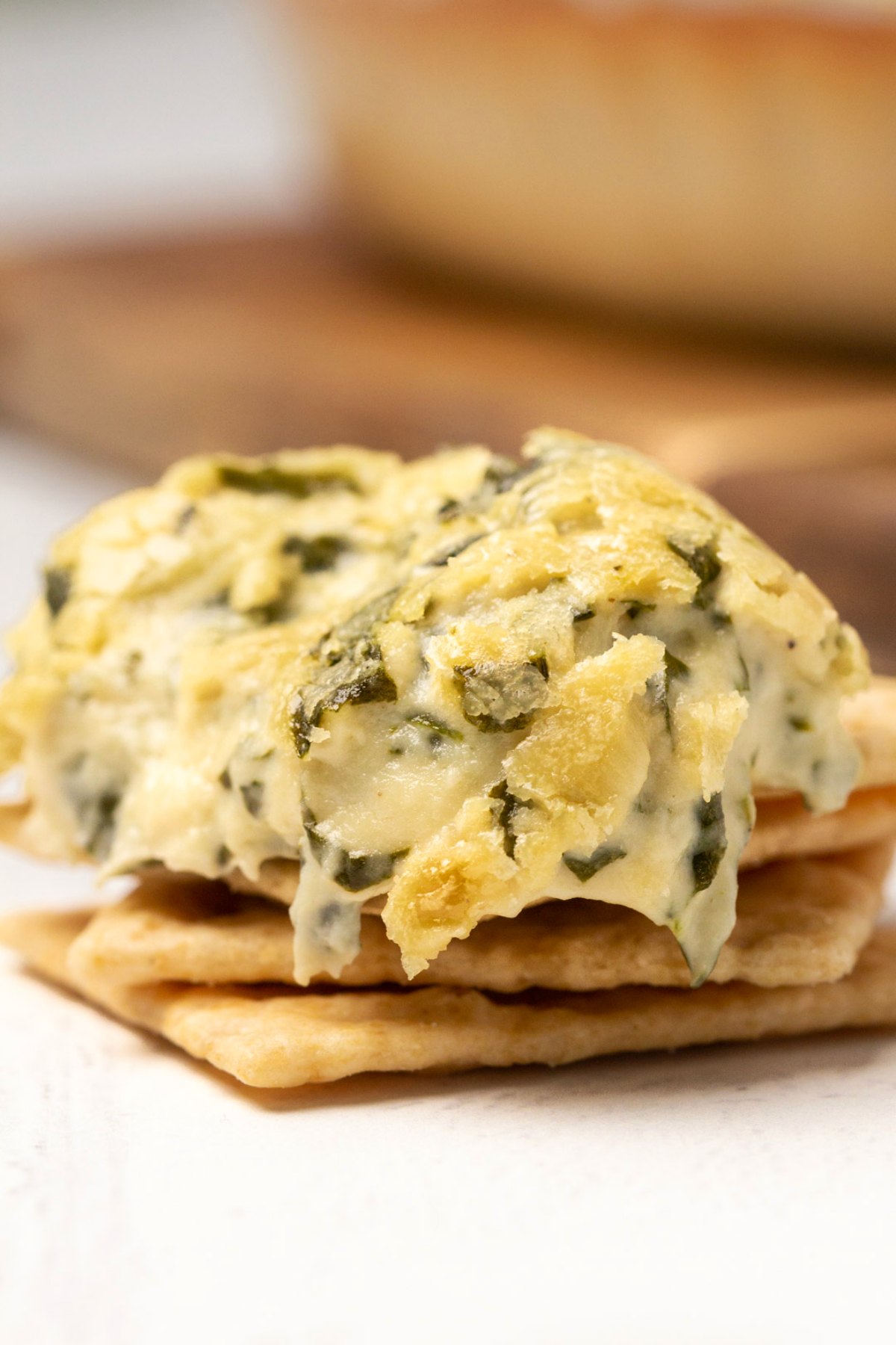 Vegan spinach dip on crackers. 